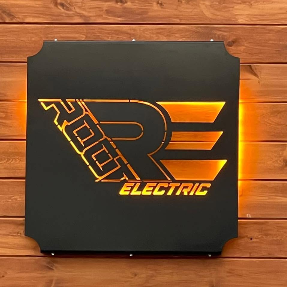 Original illuminated Root Electric sign